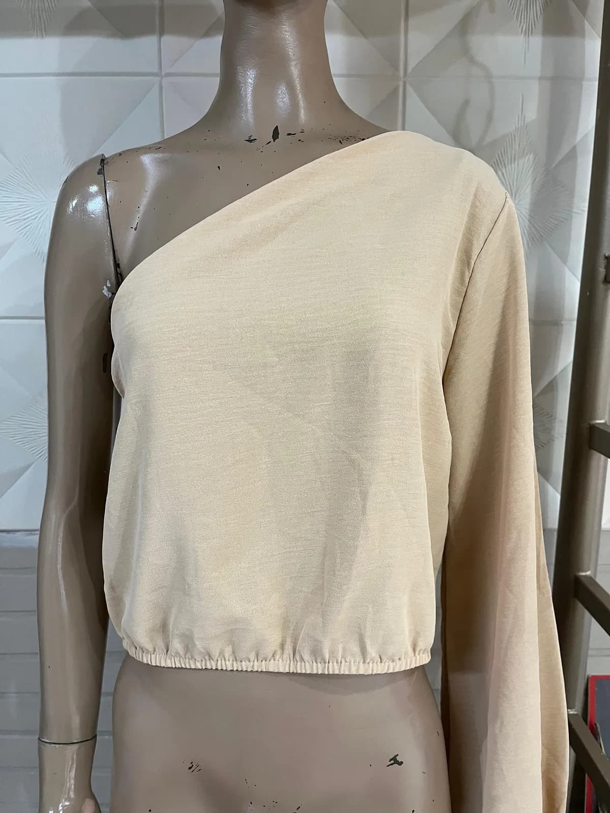 Blusa una manga